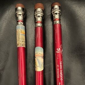 3 Oversized souvenir pencils.